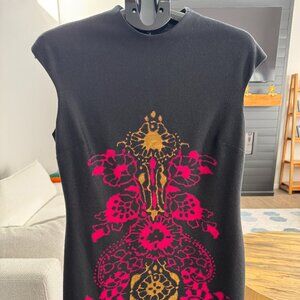 Nine West black sleeveless dress with a gold and pink pattern.